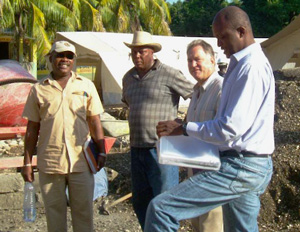 the Ti/YCF team reviewing progress zt the St. Mattieu School in Legoane, Haiti.